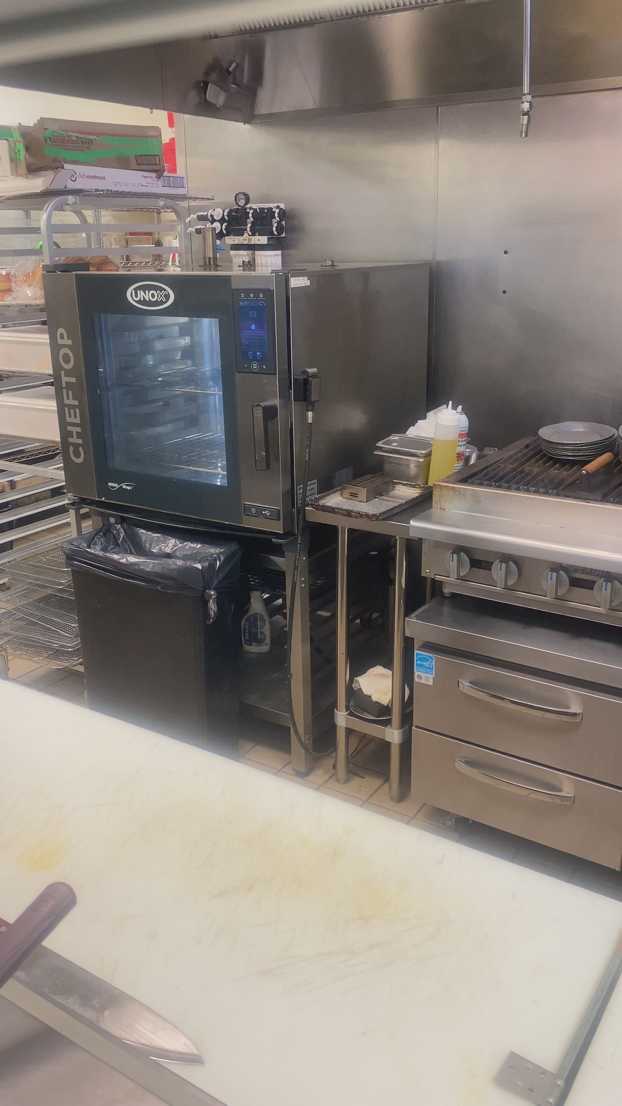 Load video: Chef Brad Daniels pulls a baked Pizza Freak from Unox Combi Oven