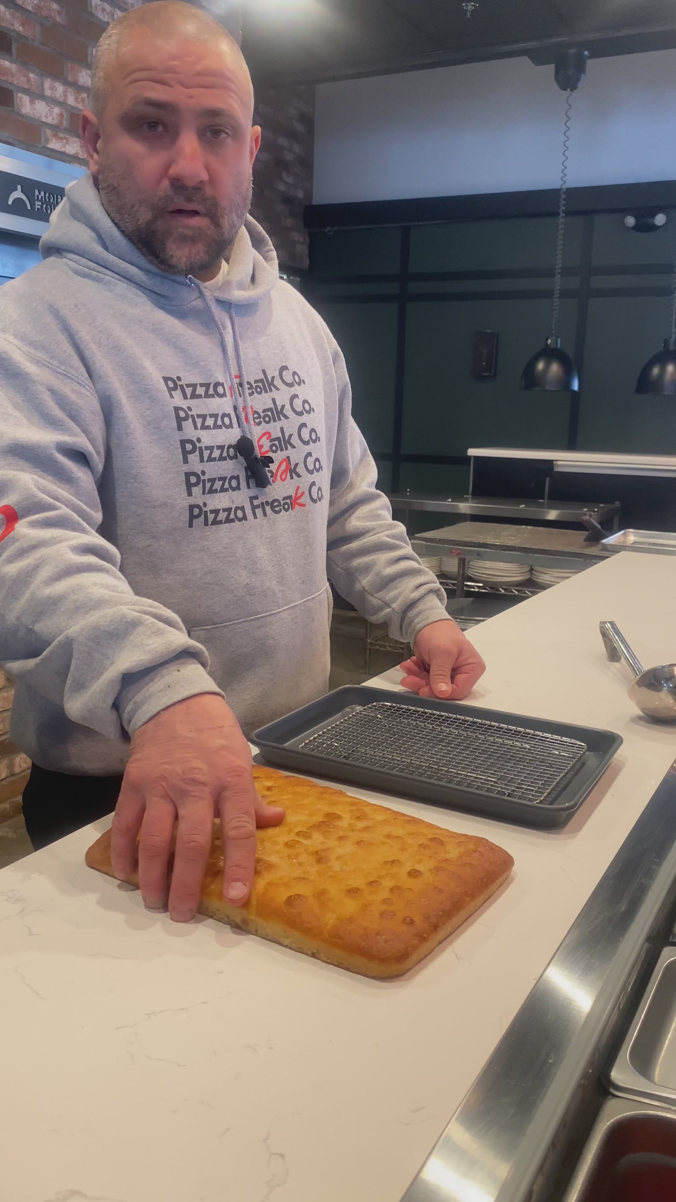 Load video: Chef Brad Daniels shows Chefs How To Bake a Delicious Pizza using Pizza Freak Freakaccia Crust